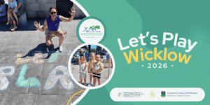 Promotional graphic for Let's Play Wicklow 2026. On the left, an outdoor event photo shows an instructor crouching over large chalk drawings on the pavement, and a circular inset photo shows three young children smiling outdoors. The right side features a green background with the text: Let's Play Wicklow 2026. Partner logos at the bottom include Wicklow Sports and Recreation Partnership, the Department of Children, Equality, Disability, Integration and Youth, Healthy Wicklow, and Wicklow County Council.